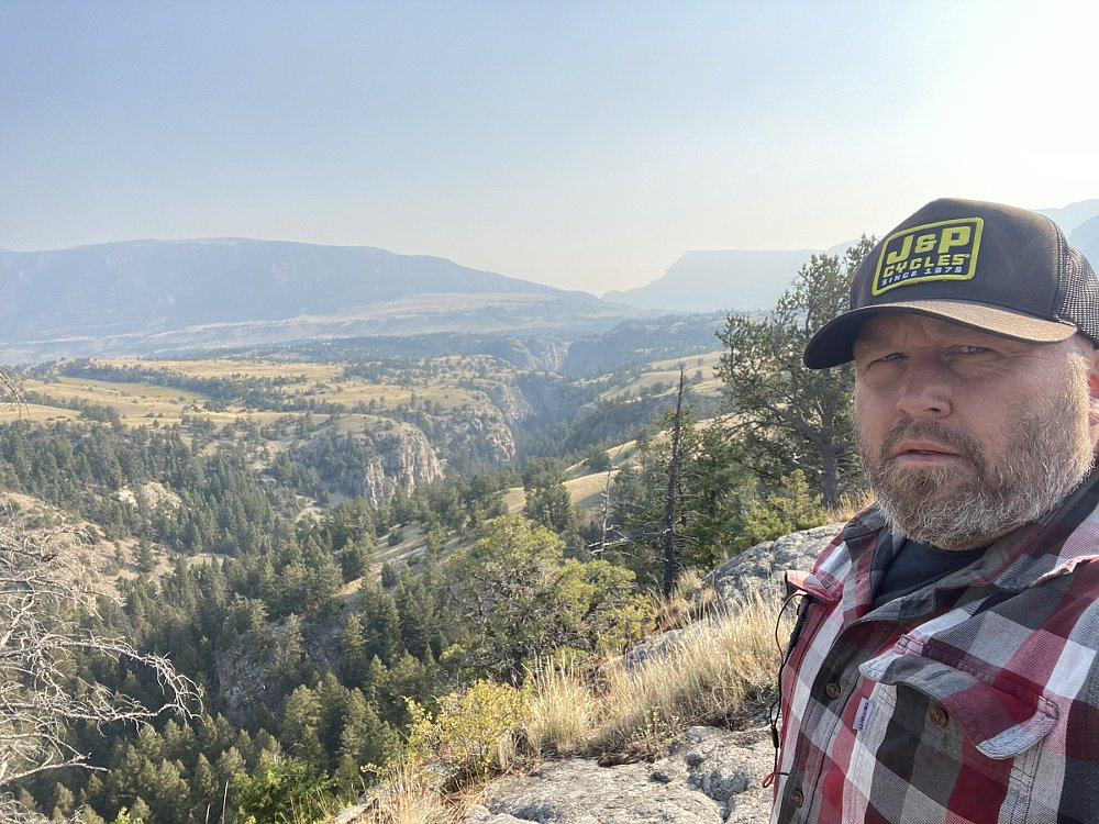 a selfie of the writer overlooking the mountains