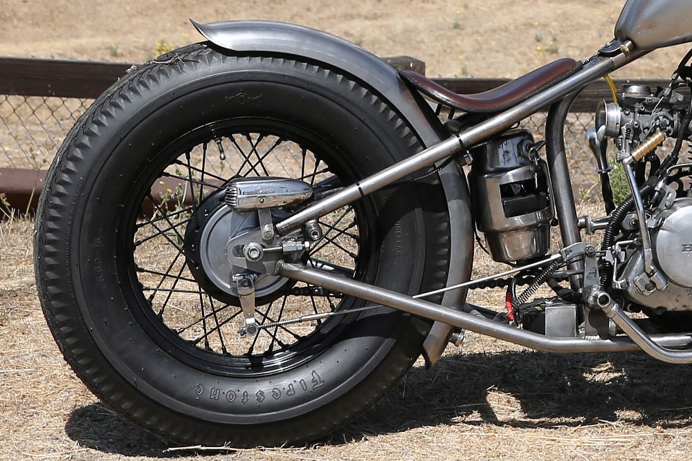 close view of the rear wheel showing no suspension