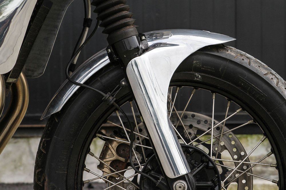 close view of the chrome front fender and wheel